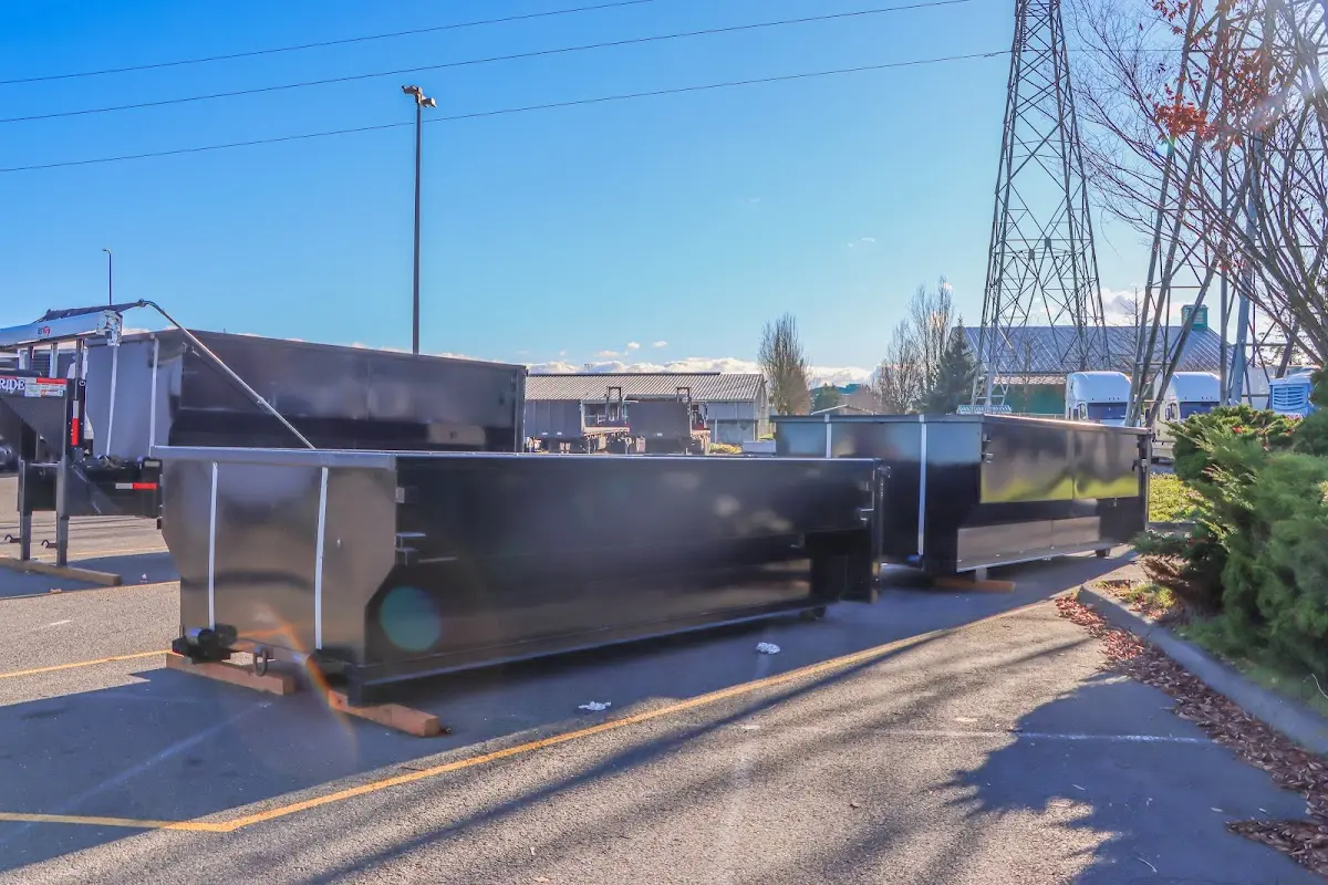 Roll-off dumpster ready for waste disposal at job site for Construction Dumpster Rental in Kingsbury